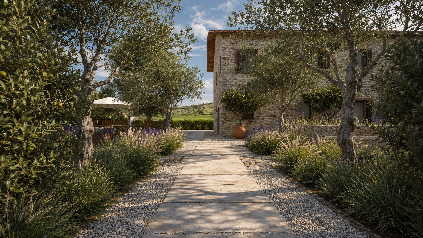 Il vialetto d’ingresso tra pietra, ghiaia e vegetazione